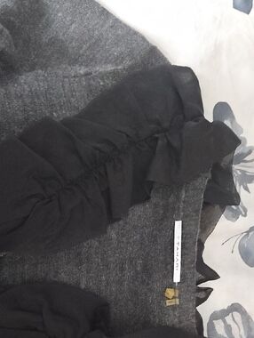 Gray Knit Top with Black Ruffle Trim